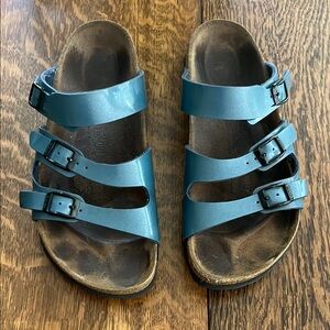 Birkenstock Metallic Teal Triple-Strap Sandals with Black Buckles